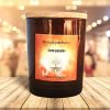 Bougie parfumée Coco Passion dans un pot en verre ambré